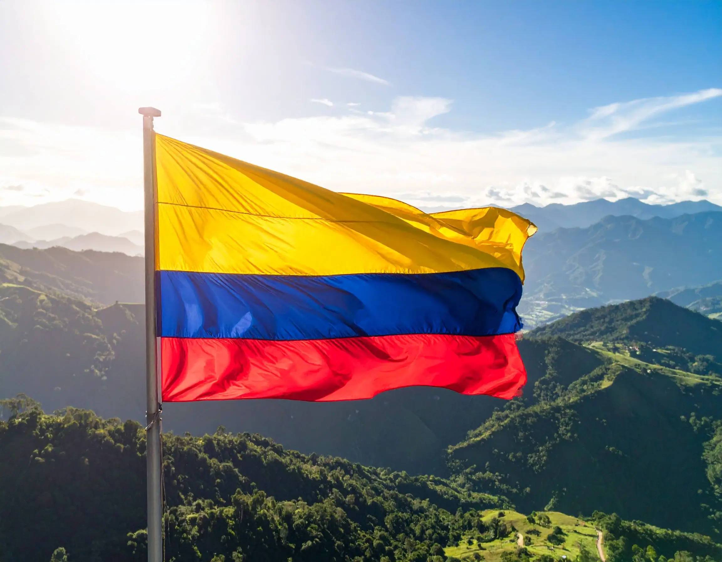 Colombian flag over the Andes